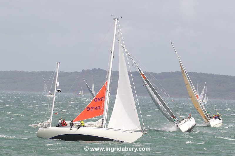 The Rolex Fastnet Race fleet pass Hurst Castle photo copyright Ingrid Abery / www.ingridabery.com taken at Royal Ocean Racing Club and featuring the MOD70 class