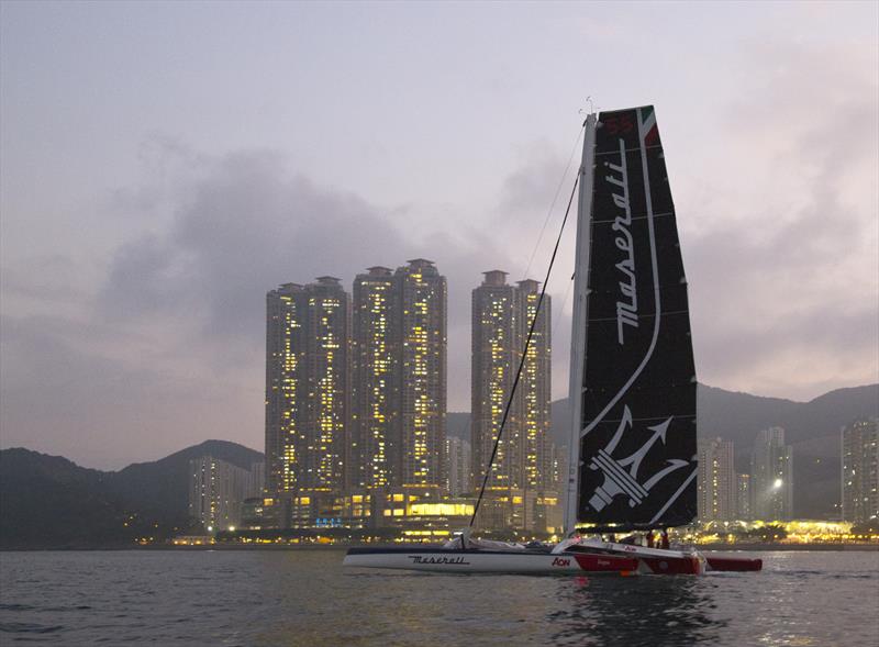 Leaving the bright lights behind. Maserati Multi70 slips out of Hong Kong heading for London photo copyright Guy Nowell taken at  and featuring the MOD70 class