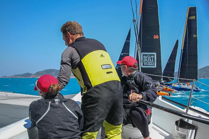 Carrington Brady (left) Matt Humphries, and Gavin Brady are all concentration at the Multihull start at Hamilton Island Race Week - photo © Richard Gladwell / Sail-World.com