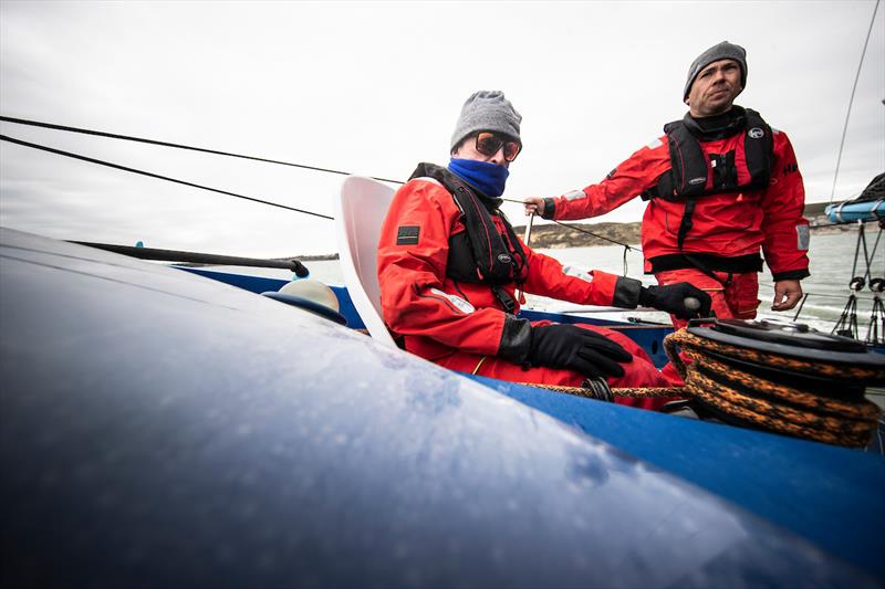 Peter Cunningham on the helm of MOD70 PowerPlay - photo © Lloyd Images