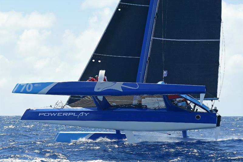 Peter Cunningham's MOD70 PowerPlay (CAY) flipped a wheelie on final approach before blasting off into the lead of the 13th RORC Caribbean 600 in a ball of spray at over 25 knots - photo © Rick Tomlinson / www.rick-tomlinson.com