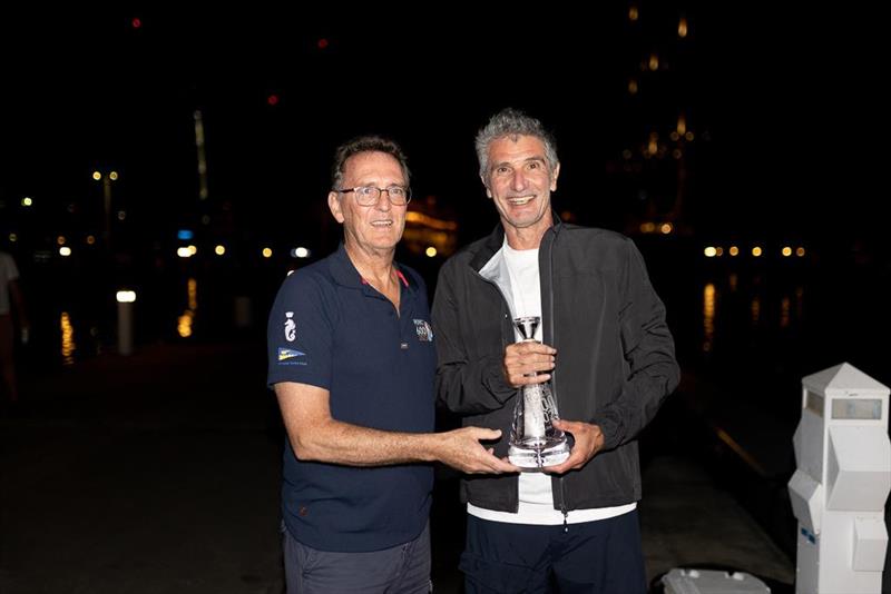 Erik Maris (R) and RORC CEO Jeremy Wilton (L) after finishing the RORC Caribbean 600 photo copyright Arthur Daniel / RORC taken at Royal Ocean Racing Club and featuring the MOD70 class