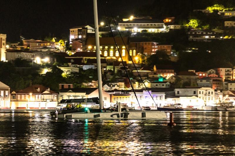 Argo makes her way along the Carenage in St George's before docking and celebrating - 2024 RORC Transatlantic Race - photo © Arthur Daniel / RORC