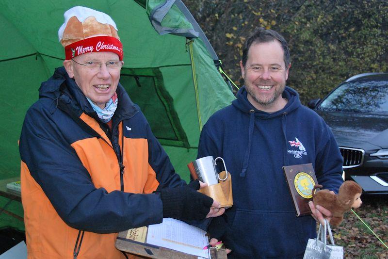 Roger Stollery (L) presents Brass Monkey and GAMES trophies to the winner, Rob Vice, in the Marblehead Brass Monkey and GAMES 11 event at Abbey Meads Lake - photo © GMYC