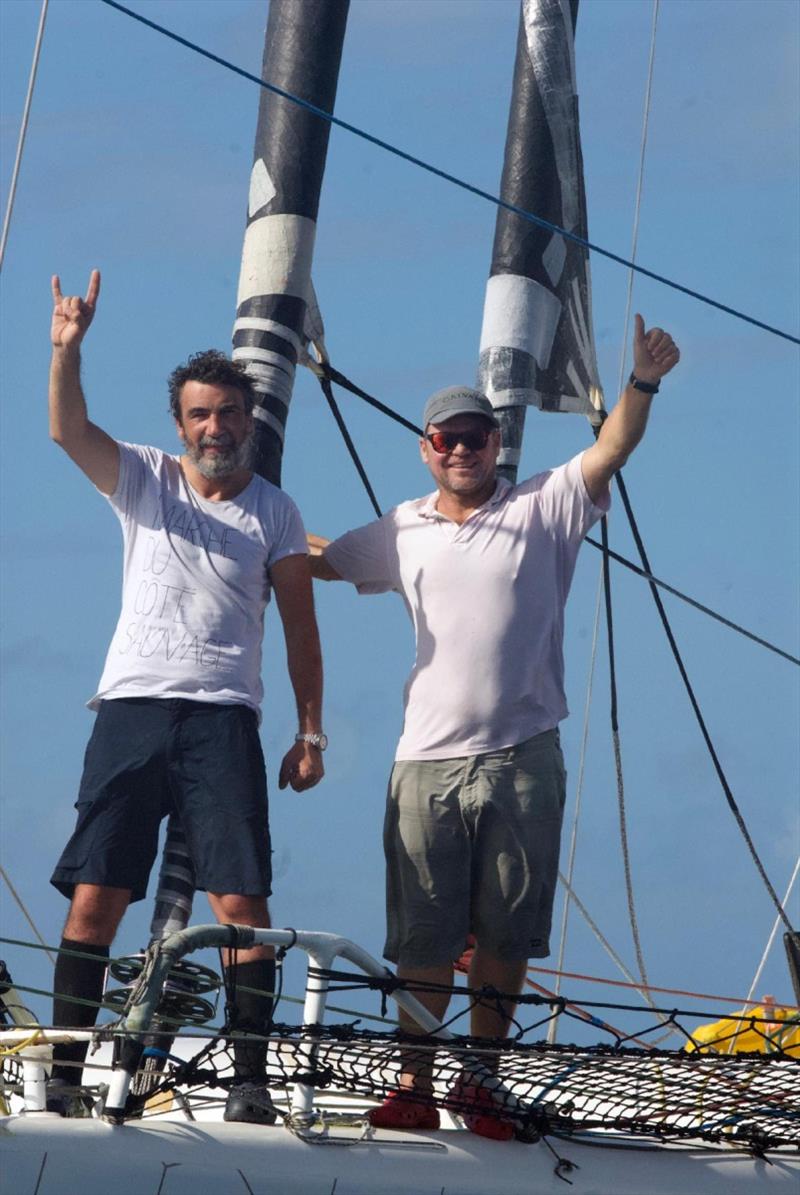 Enjoying their line honours success in Antigua - Oren Nataf - member of Yacht Club de Monaco and decorated Spanish offshore sailor - Alex Pella photo copyright Ed Gifford / RORC taken at Royal Ocean Racing Club and featuring the Multi 50 class