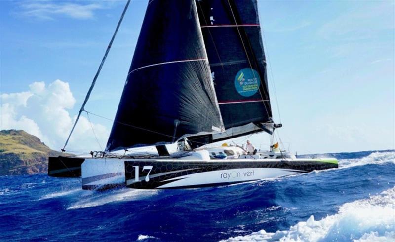 Crossing the finish line in Antigua at full speed - Multihull Line Honours in the RORC Transatlantic Race for Oren Nataf's Multi50 Trimaran Rayon Vert, skippered by Alex Pella photo copyright Ed Gifford / RORC taken at Royal Ocean Racing Club and featuring the Multi 50 class