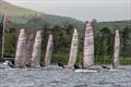 Race start for the Musto Skiff fleet during the Ullswater Daffodil Regatta 2025