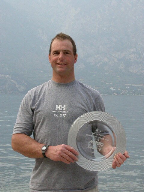 Richard Stenhouse wins the 2003 Musto Skiff World Cup on Lake Garda photo copyright Paul Manning taken at  and featuring the Musto Skiff class