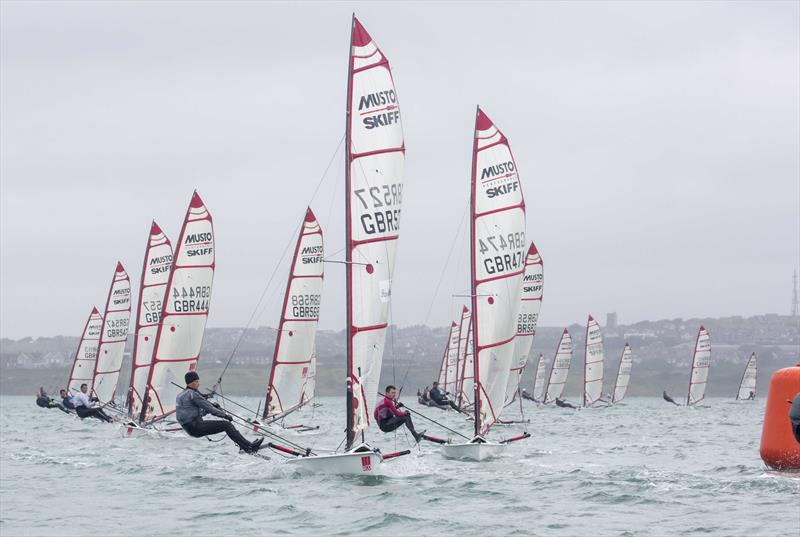 Musto Skiff UK Nationals at Castle Cove SC day 4 photo copyright Tim Olin / www.olinphoto.co.uk taken at Castle Cove Sailing Club and featuring the Musto Skiff class