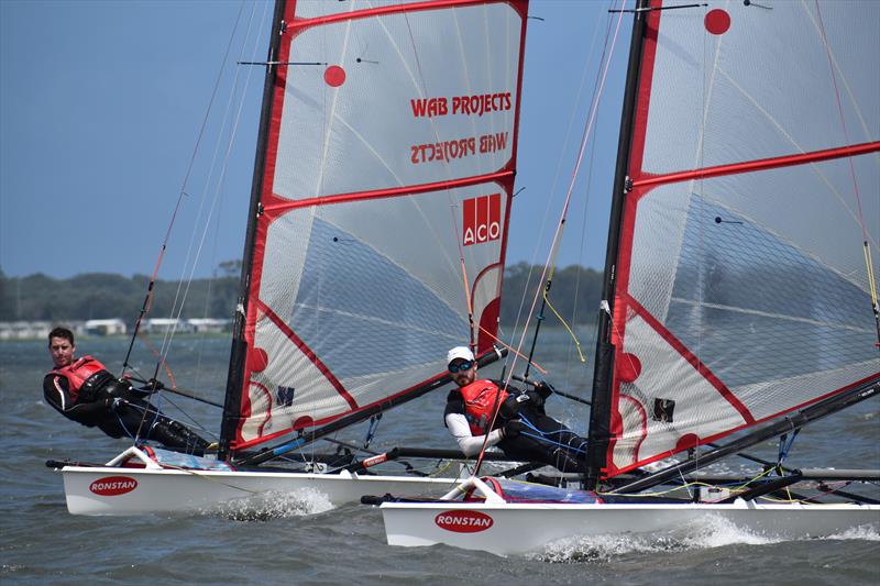 Paul Newman (2nd overall, on left) congratulates his brother, Jon Newman, for winning the 2022 Australian Musto Skiff Nationals photo copyright Brendan Markey taken at Illawarra Yacht Club and featuring the Musto Skiff class