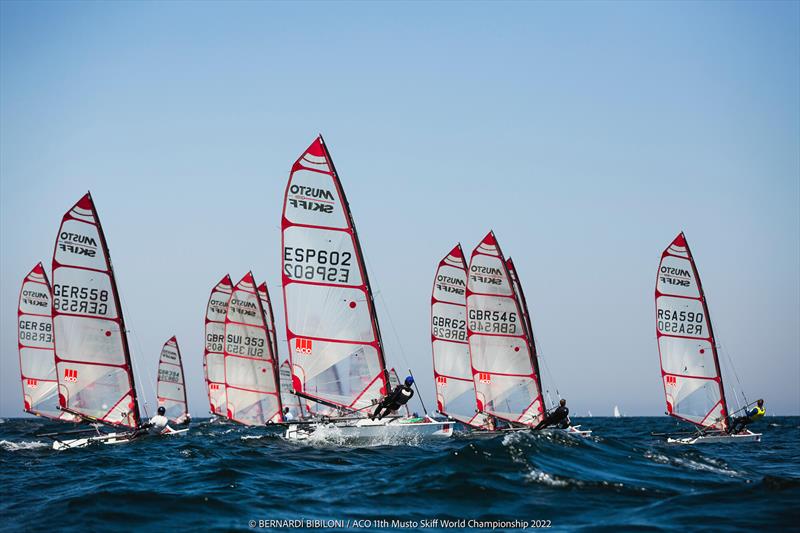 Racing on day 3 of the 11th ACO Musto Skiff World Championship at Kiel Week photo copyright Bernardí Bibiloni / www.bernardibibiloni.com taken at Kieler Yacht Club and featuring the Musto Skiff class