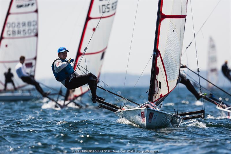 Josh Belben at the ACO 11th Musto Skiff World Championships 2022 photo copyright Bernardí Bibiloni / www.bernardibibiloni.com taken at Kieler Yacht Club and featuring the Musto Skiff class