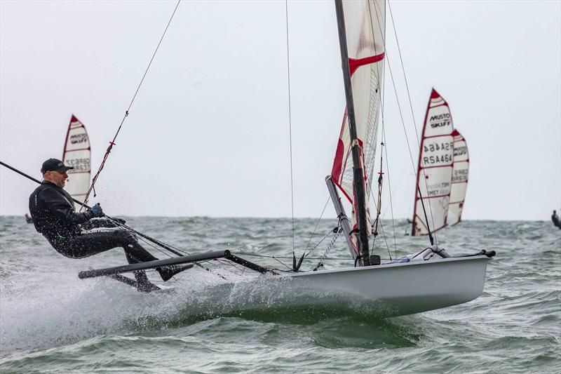 Bruce Keen - Noble Marine 2022 UK Musto Skiff National Championship 2022 photo copyright Tim Olin / www.olinphoto.co.uk taken at Eastbourne Sovereign Sailing Club and featuring the Musto Skiff class