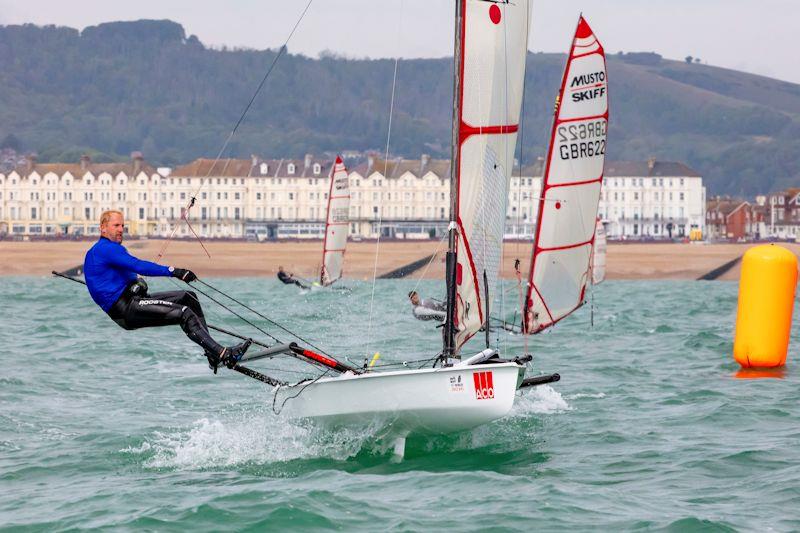 Jono Shelley - Noble Marine 2022 UK Musto Skiff National Championship photo copyright Tim Olin / www.olinphoto.co.uk taken at Eastbourne Sovereign Sailing Club and featuring the Musto Skiff class