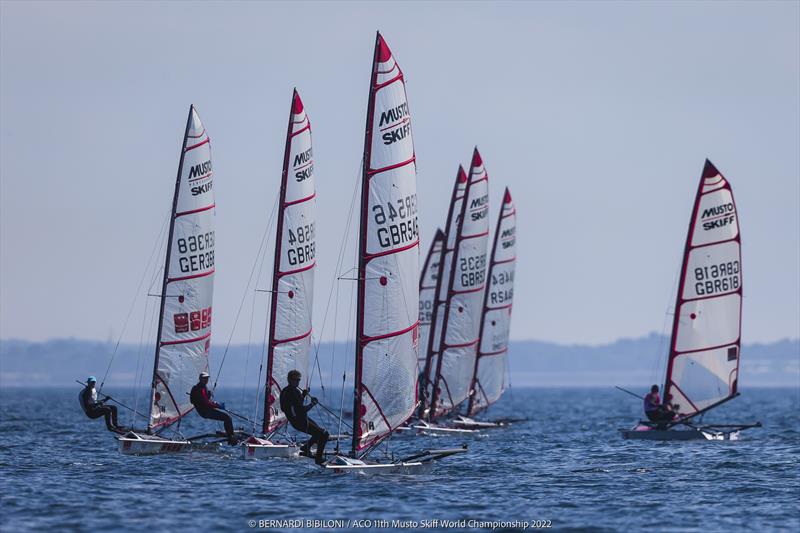 Musto Skiffs - 2022 Worlds photo copyright Bernardí Bibiloni / www.bernardibibiloni.com taken at Kieler Yacht Club and featuring the Musto Skiff class