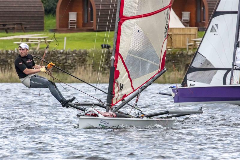 Dylan Noble during the Musto Skiffs at the Ullswater Yacht Club Daffodil Regatta 2023 photo copyright Tim Olin / www.olinphoto.co.uk taken at Ullswater Yacht Club and featuring the Musto Skiff class