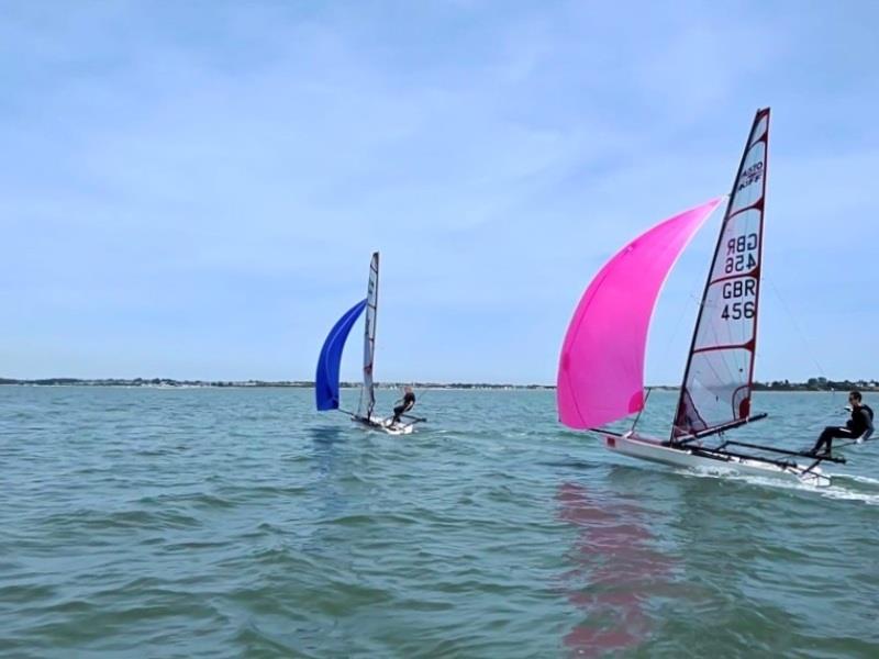 Musto Skiffs Training downwind – Saturday photo copyright Rebecca Bines taken at Brightlingsea Sailing Club and featuring the Musto Skiff class