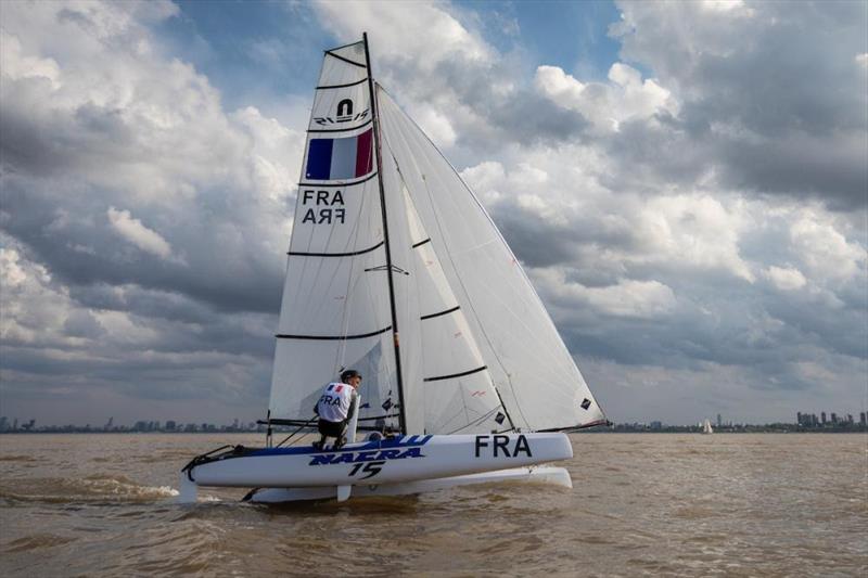 Titouan Petard and Kenza Coutard (FRA) lift a hull just off San Isidro photo copyright Matias Capizzano / World Sailing taken at  and featuring the Nacra 15 class