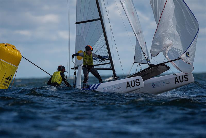 Will Cooley and Rebecca Hancock (AUS) have an unassailable nine point lead going into the medal race at the Hempel Youth Sailing World Championships photo copyright Szymon Sikora / World Sailing taken at  and featuring the Nacra 15 class