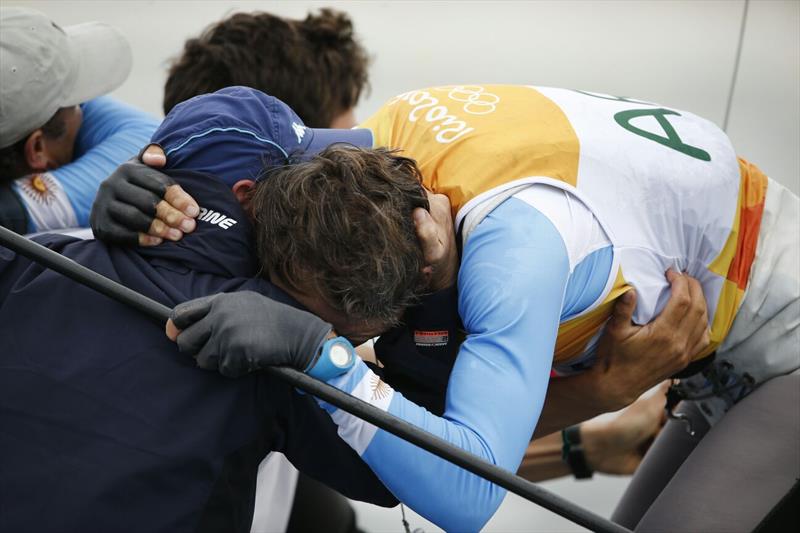 Tears of joy for Santiago Lange after winning gold in the Nacra 17 class at the Rio 2016 Olympic Sailing Competition photo copyright Sailing Energy / World Sailing taken at  and featuring the Nacra 17 class