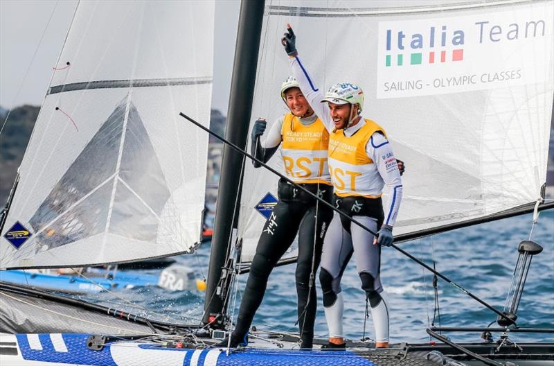 Caterina Banti (L) celebrates with helm Ruggero Tita (ITA) after securing victory at Ready Steady Tokyo photo copyright Jesus Renedo / Sailing Energy / World Sailing taken at  and featuring the Nacra 17 class