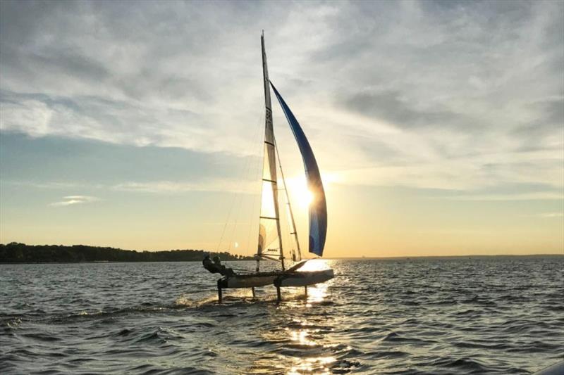 Acorns go full send at sunset photo copyright Oakcliff Sailing taken at Oakcliff Sailing Center and featuring the Nacra 17 class