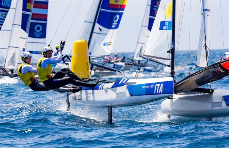 Ruggero Tita and Caterina Banti (ITA) leading around the weather mark photo copyright Sailing Energy / World Sailing taken at  and featuring the Nacra 17 class