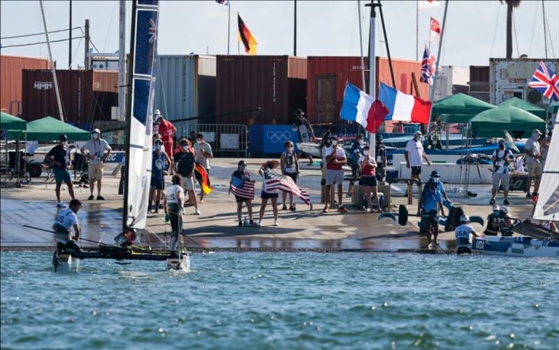 USA shore welcome crew ready for Riley and Anna's return - Tokyo 2020 Olympics photo copyright Sailing Energy / US Sailing taken at  and featuring the Nacra 17 class