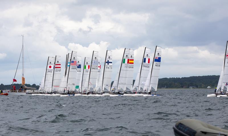 Nacra 17 start - Day 4 - European Championships - Aarhus, Denmark - July 2022 photo copyright Peter Brogger taken at Sailing Aarhus and featuring the Nacra 17 class