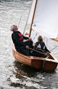 Brian Herring seeking inspiration in his 1937 Uffa King National 12, crewed by Ros Stevenson during the Yorkshire Ouse 1938 Race © Pauline Kerslake