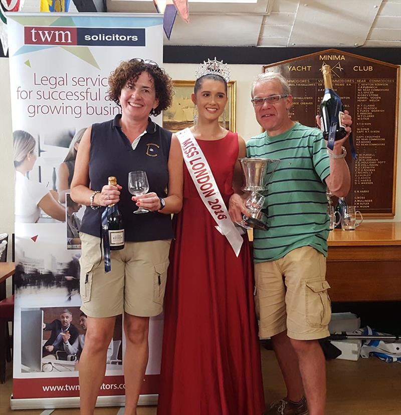 National 12 class winners Alistair Edwards and Chantelle Barletta receiving their trophy from Miss London, Chiara King during the Minima Regatta 2018 photo copyright Keith Payne taken at Minima Yacht Club and featuring the National 12 class