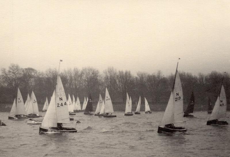Even the outbreak of war did not stop dinghy racing on the Thames in London, with Putney being the place for N12 racing in the winter. Michael is somewhere in the thick of the fleet at the far end of the line - photo © Henshall
