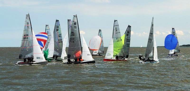 Action at the leeward mark, Two And Half Men leads from Second Wife, in the National 18 British and Irish Championships at West Mersea photo copyright Carolyne Vines taken at West Mersea Yacht Club and featuring the National 18 class