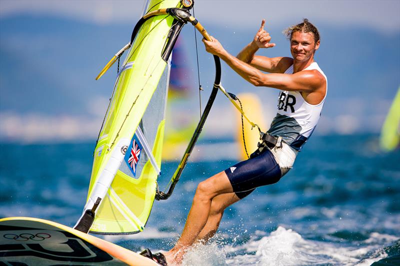 Tom Squires in the Men's RS:X on Tokyo 2020 Olympic Sailing Competition Day 1 photo copyright Sailing Energy / World Sailing taken at  and featuring the RS:X class