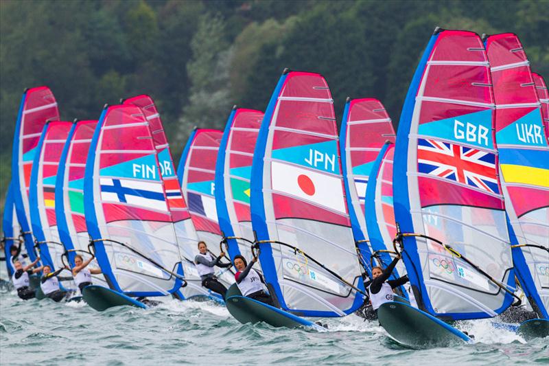 RS:X racing on day four of the London 2012 Olympic Sailing Competition photo copyright Tom Gruitt / www.tom-gruitt.co.uk taken at Weymouth & Portland Sailing Academy and featuring the RS:X class