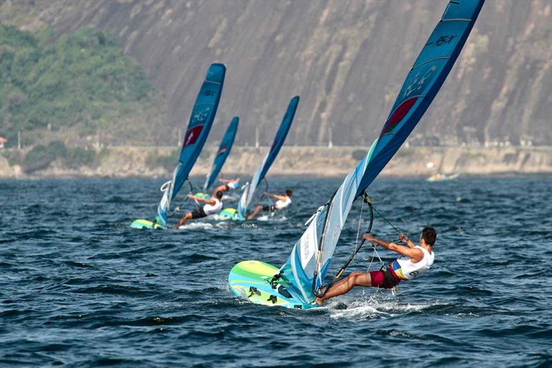 Men's RS:X head upwind on Day 2 of the 2016 Olympic Regatta photo copyright Richard Gladwell taken at  and featuring the RS:X class