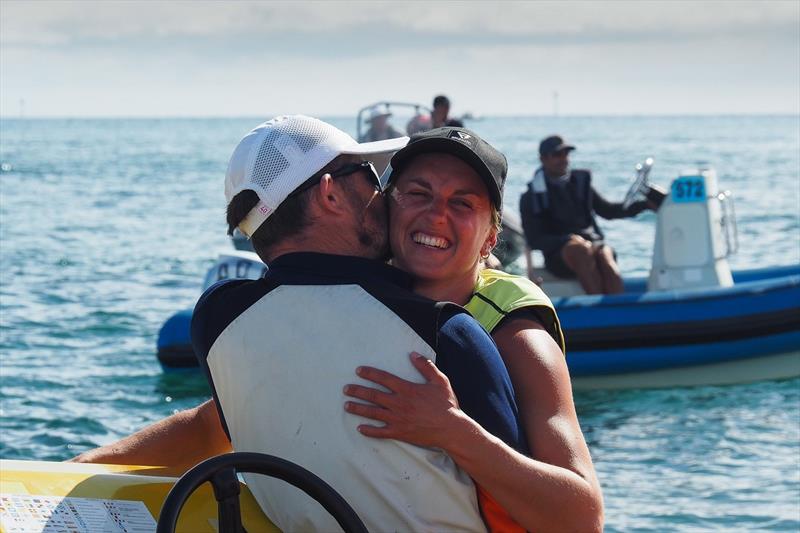 Lillian de Geus - NED, GOLD medal with coach - 2020 RS:X Windsurfing World Championships photo copyright Caitlin Baxter taken at Sorrento Sailing Couta Boat Club and featuring the RS:X class