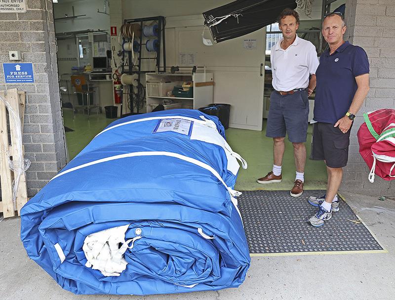 Fresh delivery! Michael Coxon and Alby Pratt inspect the new 3Di Mainsail for the supermaxi, Scallywag photo copyright John Curnow taken at  and featuring the  class
