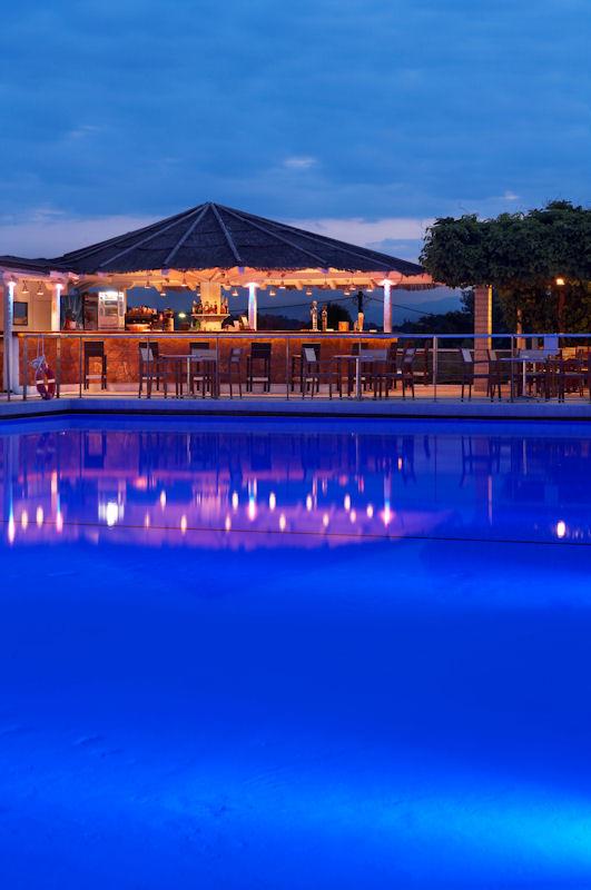 Porto Heli Beach Resort Pool Bar at dusk photo copyright Ocean Elements taken at  and featuring the  class