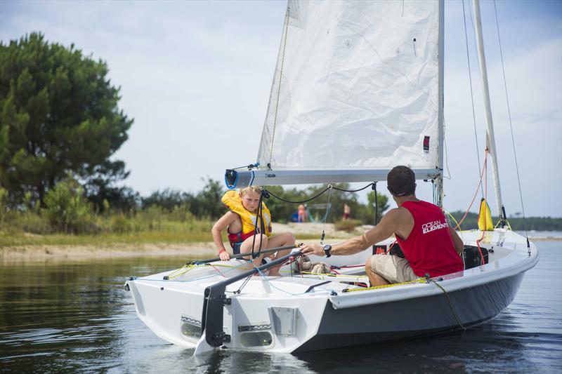 James sailing with his son at Club Mayotte, Bordeaux photo copyright Ocean Elements taken at  and featuring the  class