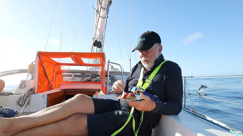 McIntyre OCEAN GLOBE 2023 – Even the dolphins joined in the 65th birthday celebrations for Explorer skipper Mark Sinclair onboard the passage to Southampton. He also celebrated his 60th birthday in the South Atlantic on the 2018 Golden Globe Race - photo © Cameron Schmidt Explorer