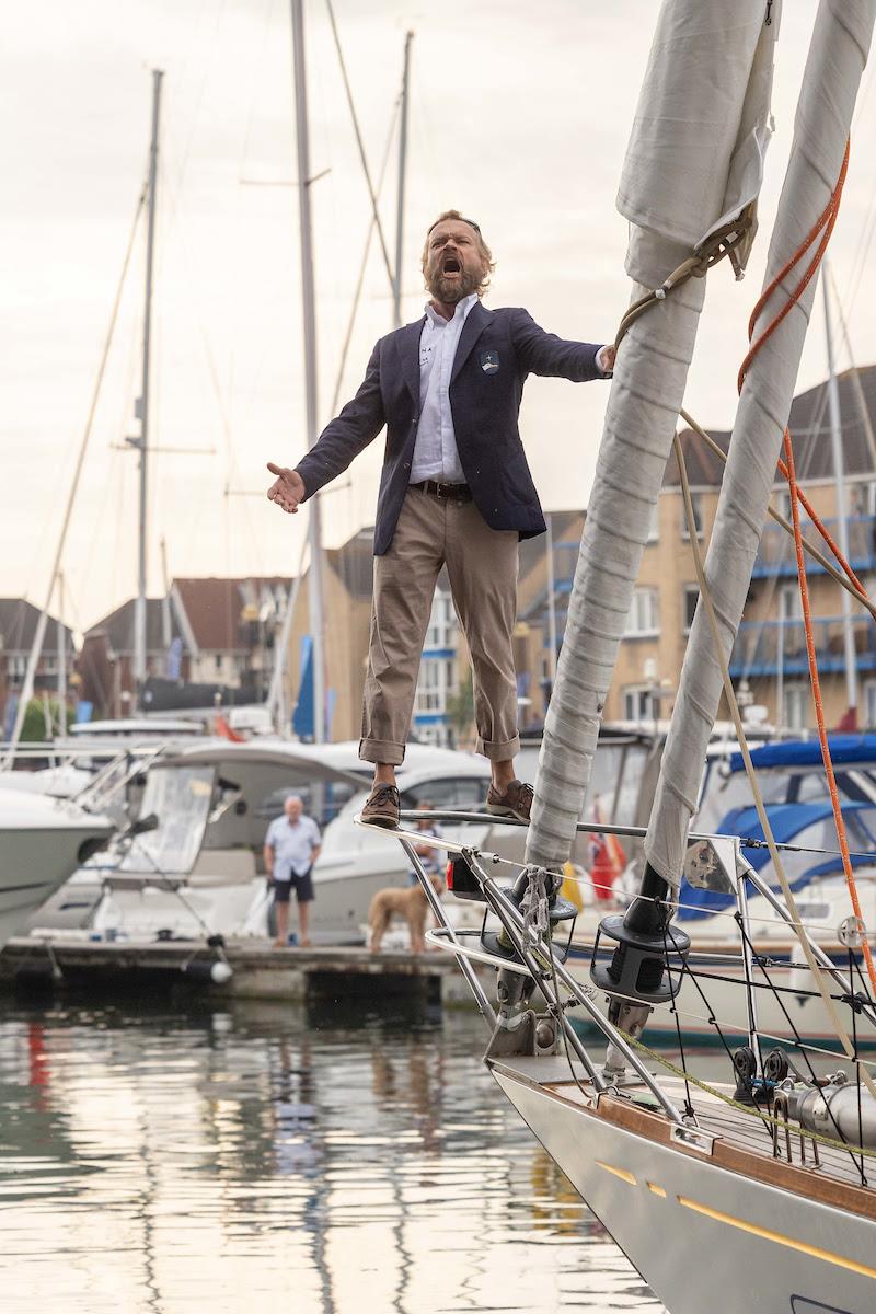 McIntyre Ocean Globe 2023 – Ville Nora, has been part of theFinnish National Opera Choir and now entertains the crowds singing “At Sea” as Galiana WithSecure FI (06) leaves to sail around the World photo copyright Tim Bishop / PPL taken at  and featuring the Ocean Globe Race class