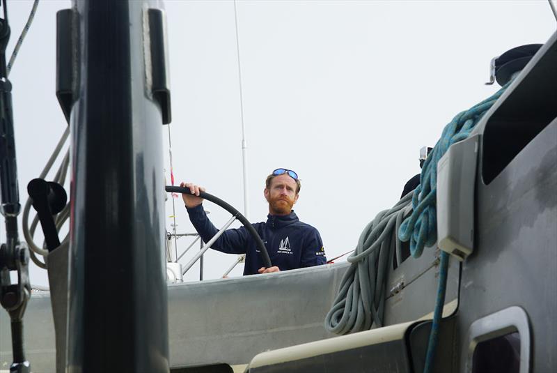 Ocean Globe Race - Tom Napper, first mate on Pen Duick VI, clearly all smiles showing how delighted he is to be back at sea photo copyright Team Pen Duick VI / OGR taken at  and featuring the Ocean Globe Race class
