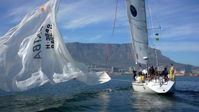 Spinnaker drama for Outlaw at the last minute crossing the line after 45 days of sailing toward Cape Town - photo © OGR2023 / Rob Havill
