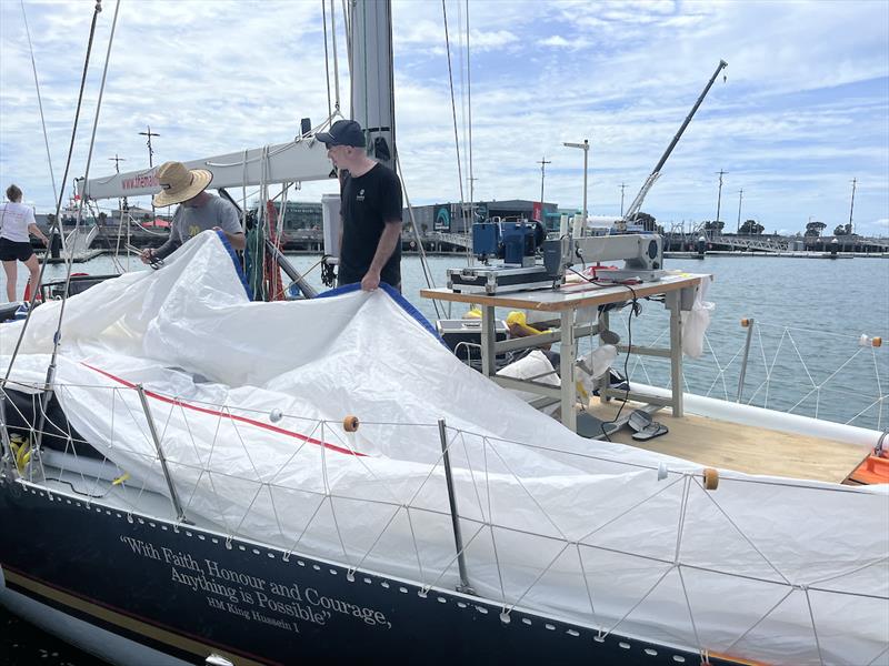 Spinnaker sail repair onboard Maiden before clocking off for Christmas break – if crews want to take sails off the boat for repairs they'll incur a time penalty - photo © OGR2023 / Don McIntyre