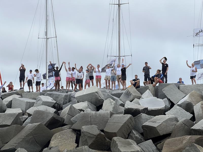 Fellow crews turn out to cheer on Translated 9 as they pass the finish line photo copyright Don McIntyre / OGR2024 taken at  and featuring the Ocean Globe Race class