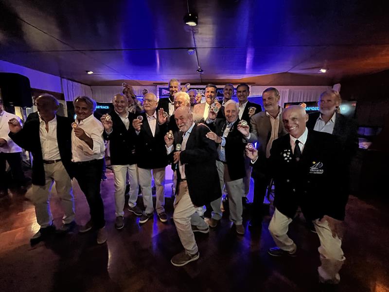 Don McIntyre presents the much sought-after Whitbread Veteran Gold Coins to the crew of Uruguay Natural photo copyright OGR2023 / Jacqueline Kavanagh taken at  and featuring the Ocean Globe Race class