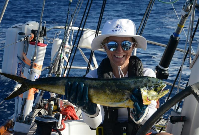Pia is clearly proud of her fishing skills onboard the Finnish yacht Galiana WithSecure - photo © OGR2023 / Galiana WithSecure