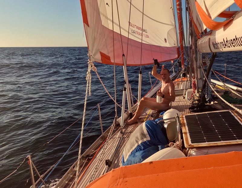 Whatever floats your boat! Skipper Mark Sinclair, washing his coconuts!!  - photo © OGR2023 / Explorer