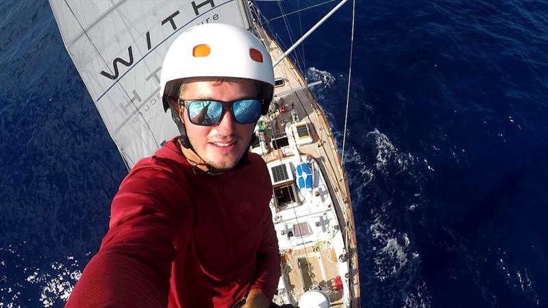 Never a dull moment onboard Galiana WithSecure with Anton up the mizzen mast checking the wind generator - photo © OGR2023 / Galiana WithSecure